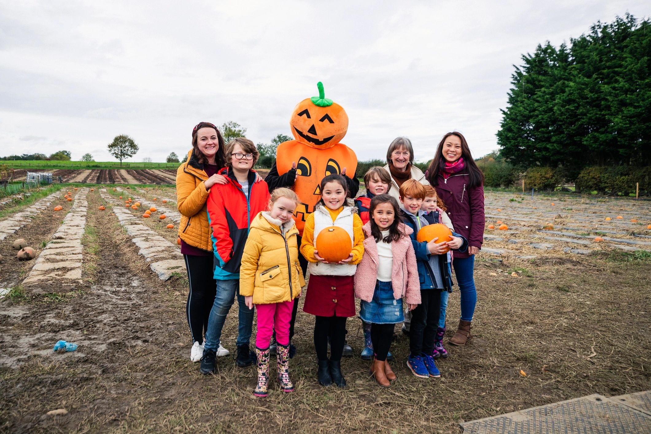 Families gathered together at a community event outdoors