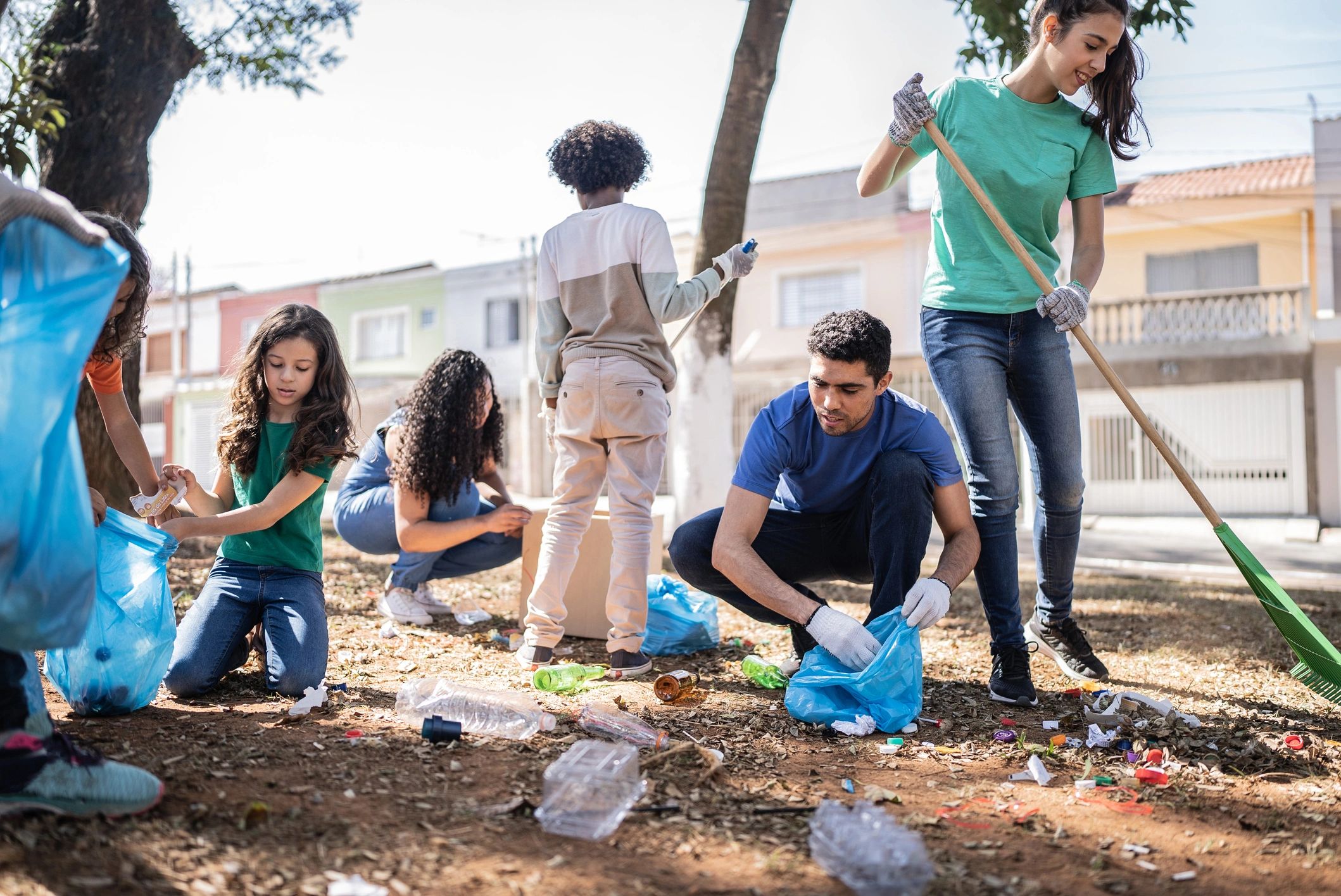 Volunteers working together outdoors in a public space