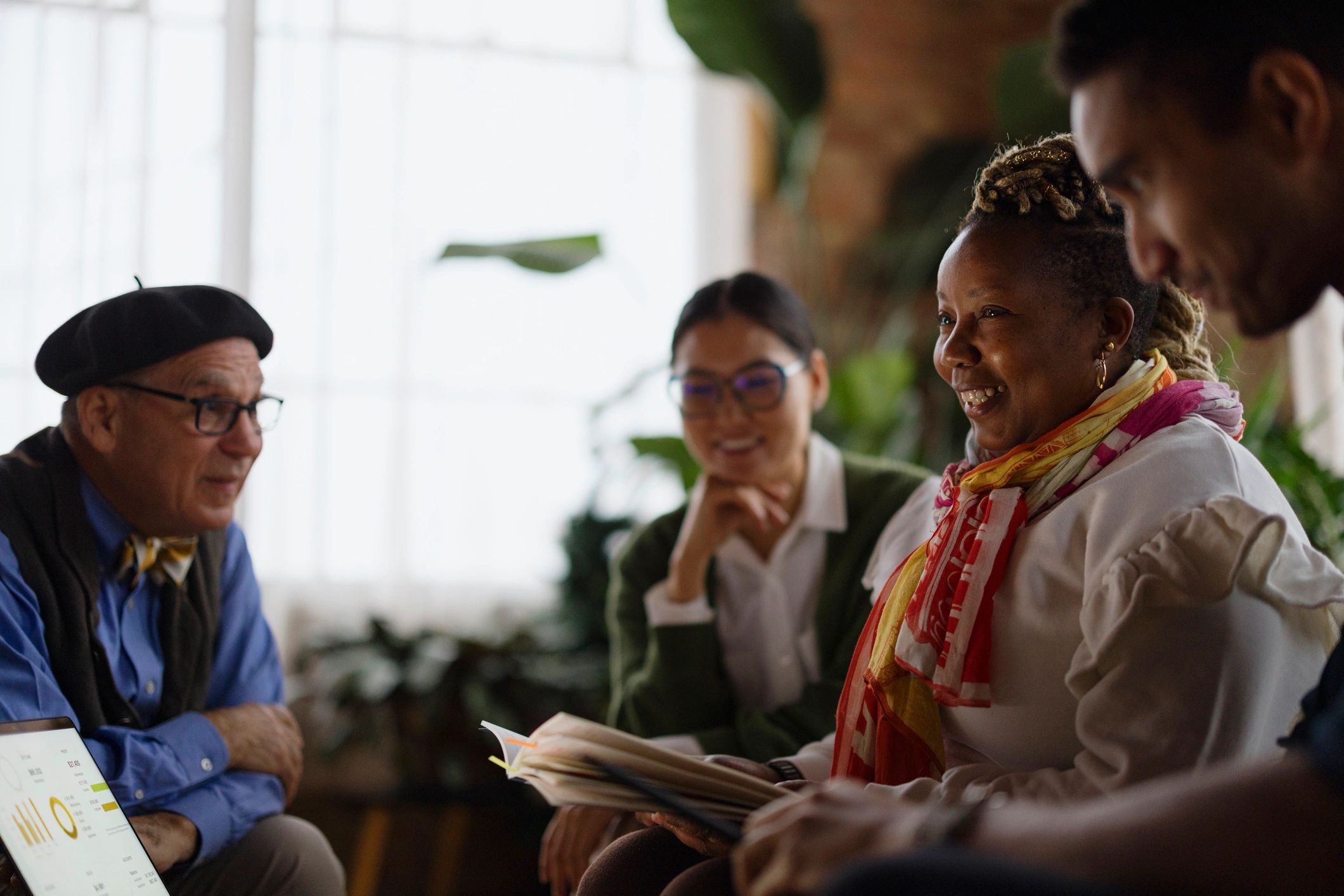 Diverse team collaborating in a casual meeting
