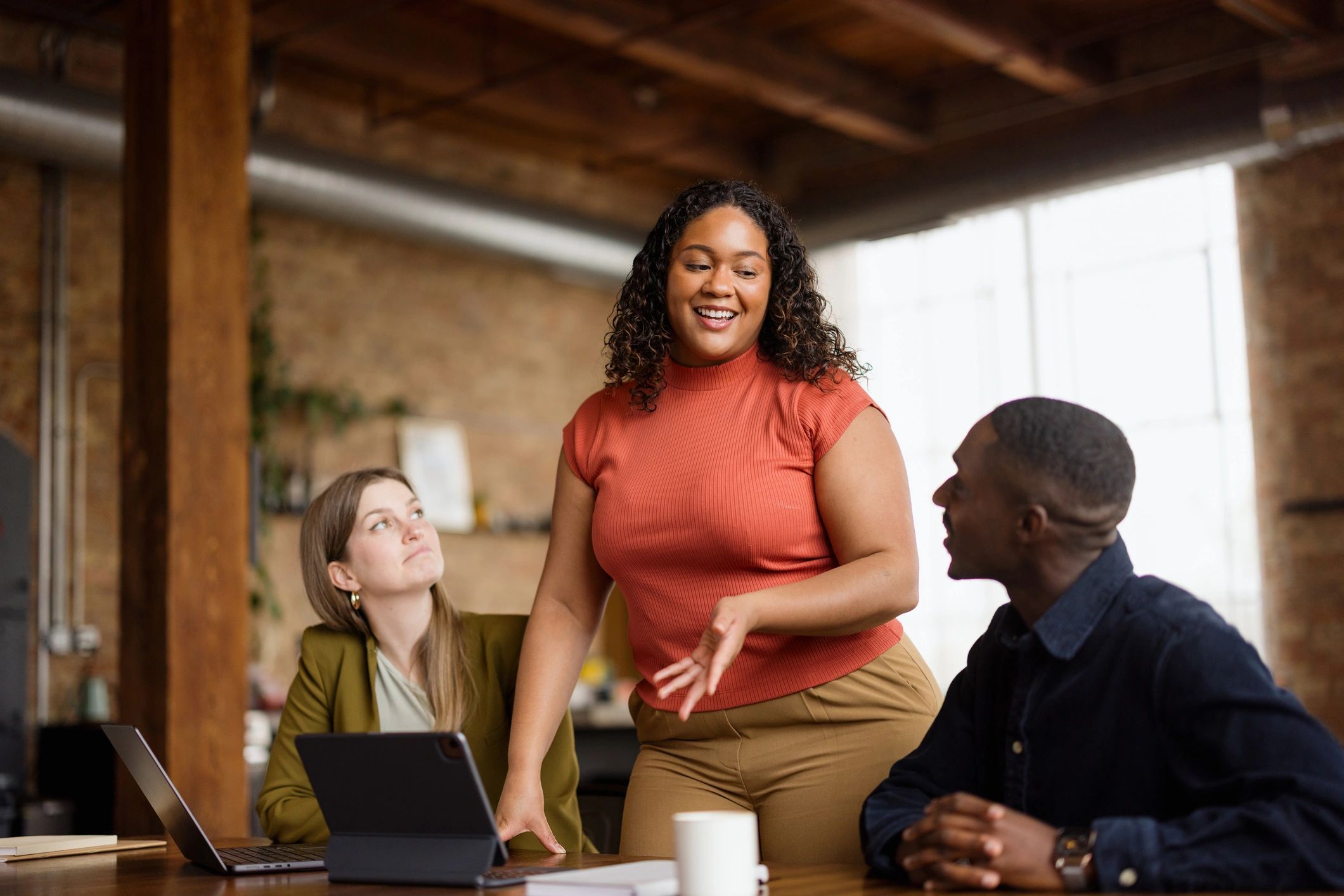 Nonprofit leader in conversation with colleagues