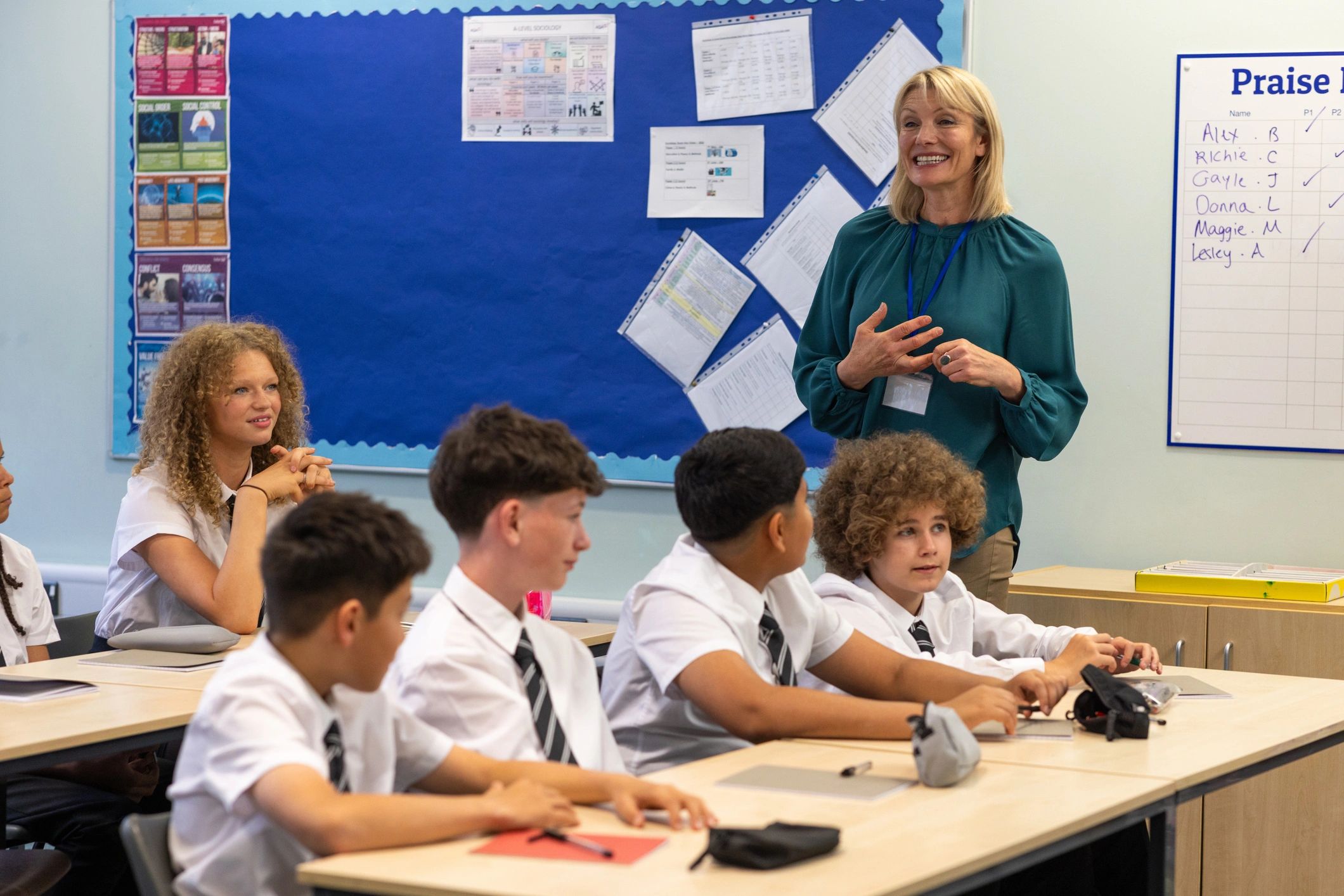 Teacher in classroom representing school partnership